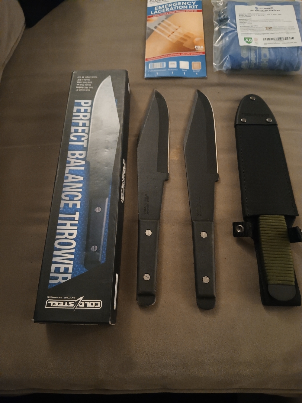 Black Throwing Knives Set with Sheath Made by Cold Steel.